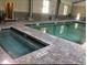 Community pool and hot tub area with tiled deck at 501 Maison Dr. # B3, Myrtle Beach, SC 29572
