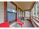 Covered porch with seating and sliding glass doors at 501 Maison Dr. # B3, Myrtle Beach, SC 29572