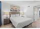 Cozy bedroom with a queen bed and stylish decor at 2000 S Ocean Blvd. # 203V, Myrtle Beach, SC 29577