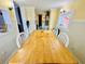 Simple dining area with a light wood table and chairs at 6001 - 1795 S Kings Hwy., Myrtle Beach, SC 29575