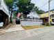 Cozy, single-story beach house featuring a front deck, siding, and American flag at 6001 - 1795 S Kings Hwy., Myrtle Beach, SC 29575