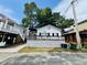 Charming single-story beach house with a spacious front porch and white picket fence at 6001 - 1795 S Kings Hwy., Myrtle Beach, SC 29575