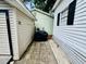 View down the side yard with utility shed and beach home at 6001 - 1795 S Kings Hwy., Myrtle Beach, SC 29575