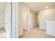 Upstairs hallway featuring neutral carpeting and white doors at 775 Brown Swamp Rd., Conway, SC 29527