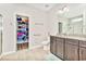 Bright bathroom with double vanity, granite countertops, shower, and a closet at 1266 Brighton Hill Ave., Myrtle Beach, SC 29588