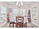 Bright dining room with stylish decor, chandelier lighting, and plenty of natural light at 1266 Brighton Hill Ave., Myrtle Beach, SC 29588