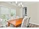 Bright dining room featuring seating for six and direct access to kitchen at 1266 Brighton Hill Ave., Myrtle Beach, SC 29588