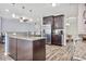 Spacious kitchen featuring a large island, stainless steel appliances and wood cabinetry at 1266 Brighton Hill Ave., Myrtle Beach, SC 29588