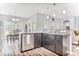 Kitchen with granite countertops, stainless steel appliances and dark wood cabinetry at 1266 Brighton Hill Ave., Myrtle Beach, SC 29588