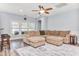 Inviting living room with a comfortable sectional sofa and plenty of natural light at 1266 Brighton Hill Ave., Myrtle Beach, SC 29588