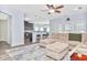 Open concept living room and kitchen featuring hardwood floors and natural light at 1266 Brighton Hill Ave., Myrtle Beach, SC 29588