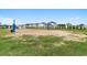Enjoy a game of beach volleyball at the community sand court, surrounded by lush green grass and beautiful homes at 3681 White Wing Circle, Myrtle Beach, SC 29579