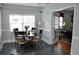 Cozy breakfast nook with round table and four chairs at 5632 Main St., Loris, SC 29569