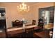 Bright dining room with hardwood floors and French doors at 5632 Main St., Loris, SC 29569