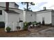 Brick patio with outdoor furniture and landscaping at 5632 Main St., Loris, SC 29569