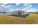 Spacious backyard with a covered patio and fenced perimeter at 136 Pampa Dr., Loris, SC 29569