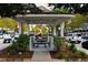 Picturesque gazebo overlooking a park with a playground, picnic tables and lush landscaping at 530 Swallow Ave. # 530, Myrtle Beach, SC 29577