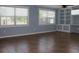 Sunlit living room with built-in shelving and large windows creates a bright and inviting atmosphere at 530 Swallow Ave. # 530, Myrtle Beach, SC 29577