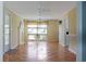 Inviting living room featuring hardwood floors, a decorative fireplace, and a bright window at 530 Swallow Ave. # 530, Myrtle Beach, SC 29577