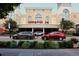 Exterior of Grand 14 movie theater with parked cars and manicured landscaping at 530 Swallow Ave. # 530, Myrtle Beach, SC 29577