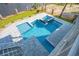 Geometric pool with spa and multiple seating areas at 129 Serenity Point Dr., Little River, SC 29566