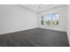 Spacious bedroom with large windows and hardwood floors at 1531 Biltmore Dr., Myrtle Beach, SC 29579