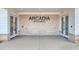 Arcadia community entrance with brick wall and modern doors at 308 Happy Valley Dr., Myrtle Beach, SC 29588