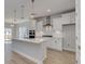 Modern kitchen with white cabinets and large island at 308 Happy Valley Dr., Myrtle Beach, SC 29588