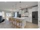 Modern kitchen with white cabinets, island, and stainless steel appliances at 308 Happy Valley Dr., Myrtle Beach, SC 29588