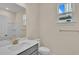 Simple bathroom with vanity, toilet and mirror at 622 Castle Ct., Myrtle Beach, SC 29579