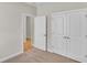 Bedroom with double door closet and carpet flooring at 622 Castle Ct., Myrtle Beach, SC 29579