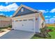 Attached garage with a neutral color exterior at 622 Castle Ct., Myrtle Beach, SC 29579