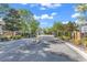 Welcoming entrance to a gated community with well-maintained landscaping at 202 Rivers Edge Dr., Conway, SC 29526