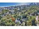 Aerial view of home nestled in a wooded area near the water at 1202 Prince William Rd., North Myrtle Beach, SC 29582