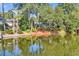 Backyard with water access and lush greenery at 1202 Prince William Rd., North Myrtle Beach, SC 29582