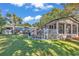 Backyard with sunroom and screened porch at 1202 Prince William Rd., North Myrtle Beach, SC 29582