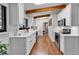 Modern kitchen featuring white shaker cabinets and a farmhouse sink at 1202 Prince William Rd., North Myrtle Beach, SC 29582