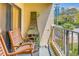 Relaxing balcony with rocking chairs, offering a peaceful outdoor space at 7509 N Ocean Blvd. # 104, Myrtle Beach, SC 29572