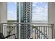 Balcony view showcasing a tall condo, the beach, and the beautiful ocean in the background at 201 S Ocean Blvd. # 1005, Myrtle Beach, SC 29577