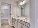 This bathroom features double sinks, a large mirror, and shower/bath combo at 126 Hancher Dr., Myrtle Beach, SC 29588