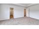Bedroom with carpeted floors and 2 doors leading to other rooms at 126 Hancher Dr., Myrtle Beach, SC 29588