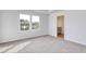 Bedroom with carpeted floors and a window overlooking the lake at 126 Hancher Dr., Myrtle Beach, SC 29588