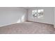 Bedroom with carpeted floors, white walls and a double window at 126 Hancher Dr., Myrtle Beach, SC 29588