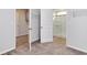 Bedroom with carpeted floors and doors leading to closet and bathroom at 126 Hancher Dr., Myrtle Beach, SC 29588