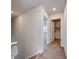 Hallway with carpeted floors leading to laundry room and bedroom at 126 Hancher Dr., Myrtle Beach, SC 29588