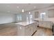 Open-concept living and kitchen area with a kitchen island at 126 Hancher Dr., Myrtle Beach, SC 29588