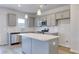 Modern kitchen with gray cabinets, stainless appliances, and white countertops at 126 Hancher Dr., Myrtle Beach, SC 29588