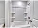 Bright bathroom featuring a shower and bath combo with a white tile surround at 126 Hancher Dr., Myrtle Beach, SC 29588