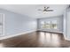 Bright bedroom with large windows and hardwood floors; ceiling fan included at 1533 Biltmore Dr., Myrtle Beach, SC 29579