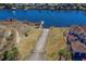 Aerial view of a private boat ramp leading to a calm waterway, offering convenient access for boating enthusiasts at 1533 Biltmore Dr., Myrtle Beach, SC 29579